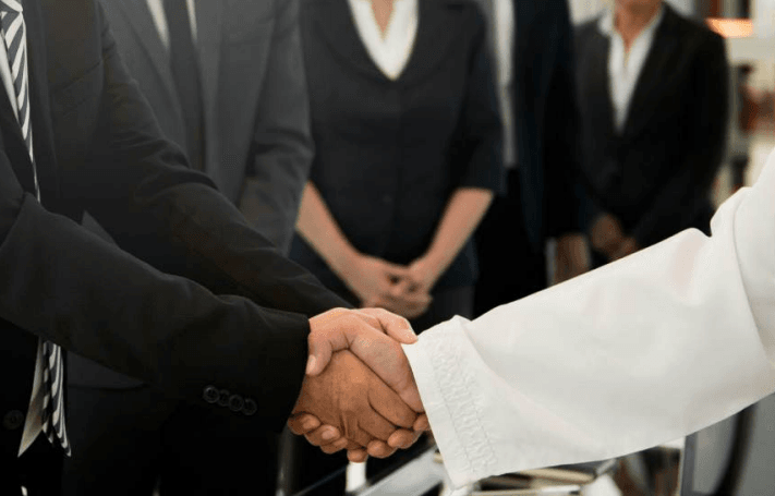 Diplomacy Handshake.png